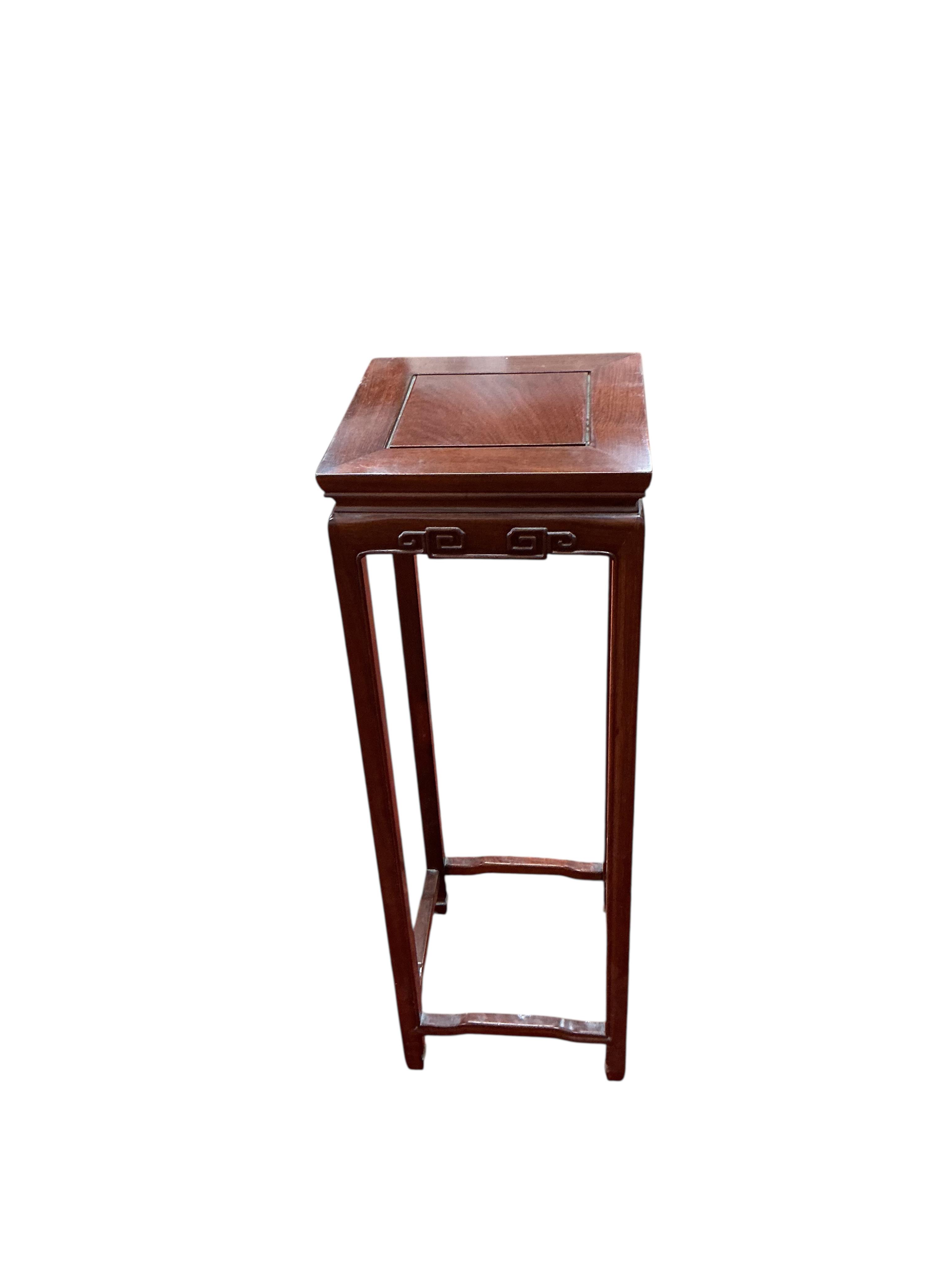 A Chinese hardwood vase stand, width 30cm, height 91cm